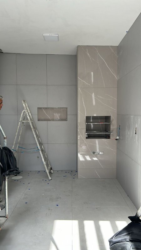 Reforma da área externa, construção de churrasqueira e revestimento